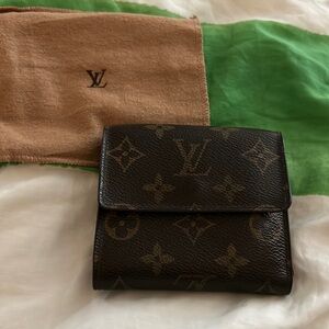 Lv compact two sided coin wallet great condition inside is regular style wallet